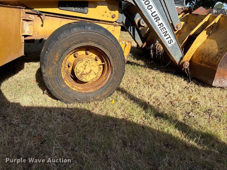 image for item EX0018 2012 John Deere 310J backhoe
