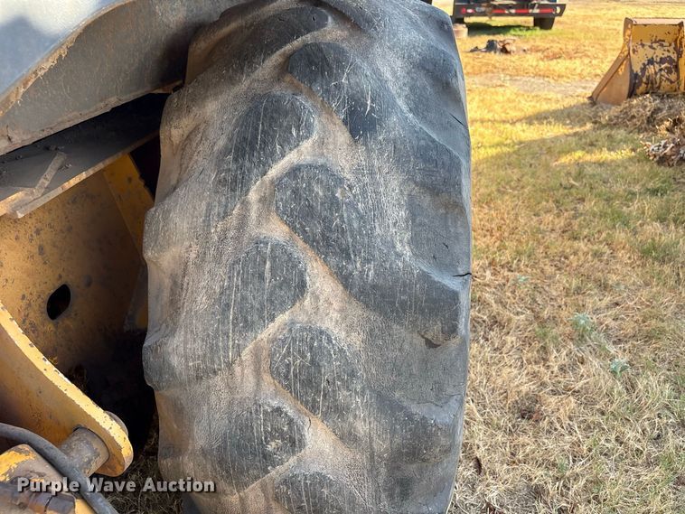 image for item EX0018 2012 John Deere 310J backhoe