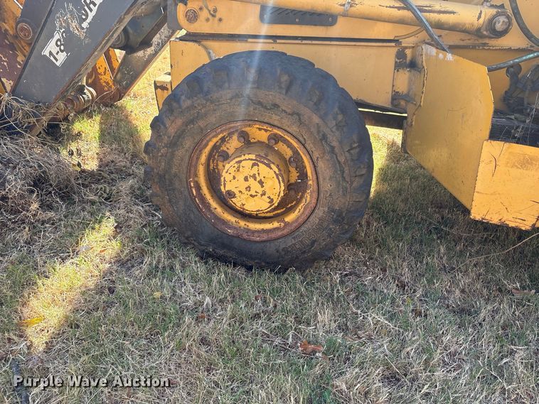 image for item EX0019 2012 John Deere 310J backhoe