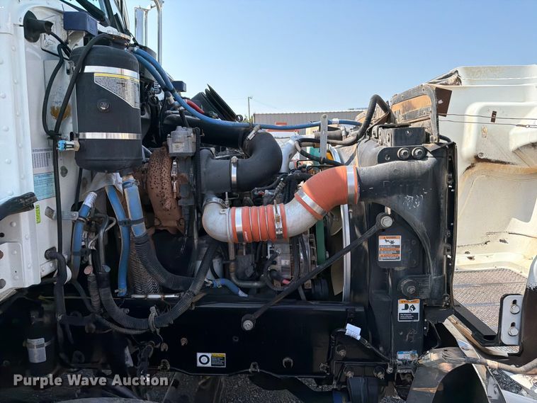 image for item FB4990 2014 Peterbilt 337 oilfield acidizing pump truck