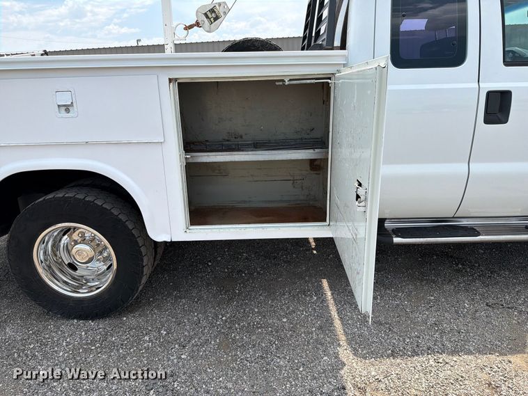 image for item FB5034 2011 Ford F350 Super Duty Ext. Cab utility bed pickup truck