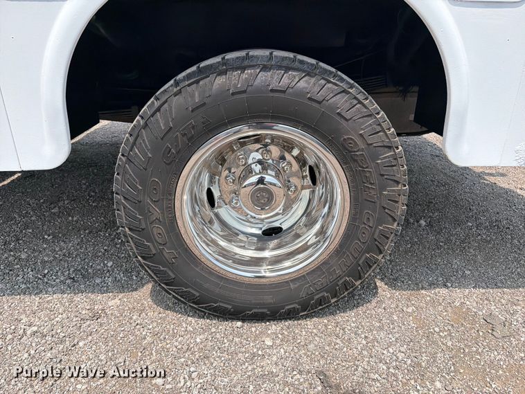 image for item FB5034 2011 Ford F350 Super Duty Ext. Cab utility bed pickup truck