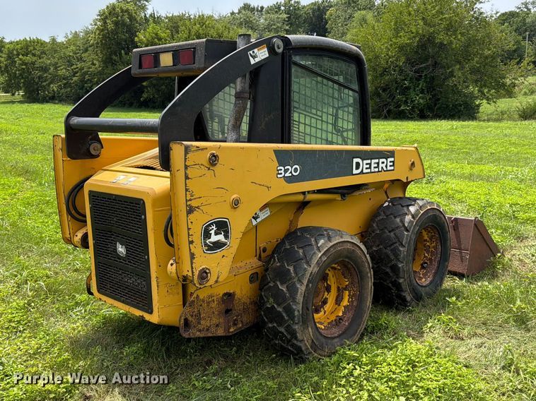image for item FK3313 2005 John Deere 320 skid steer loader
