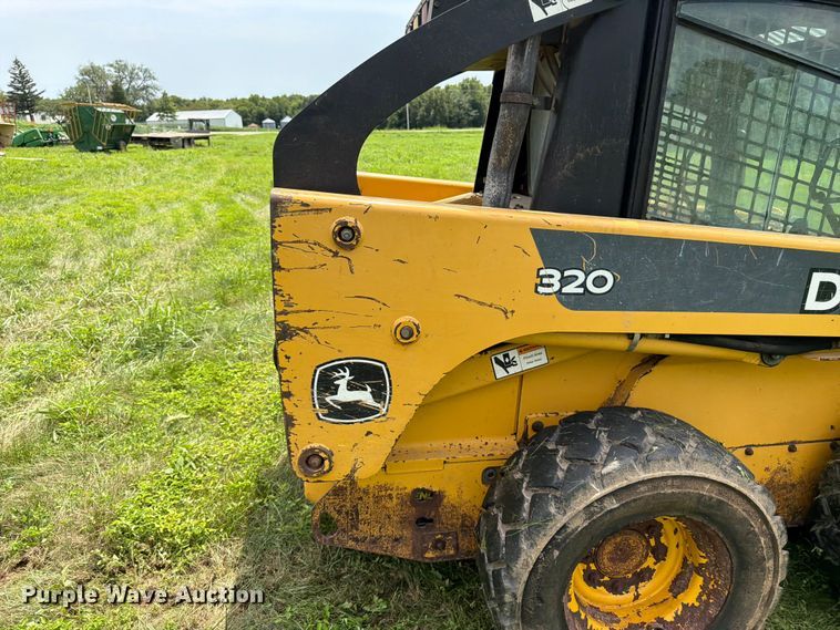 image for item FK3313 2005 John Deere 320 skid steer loader