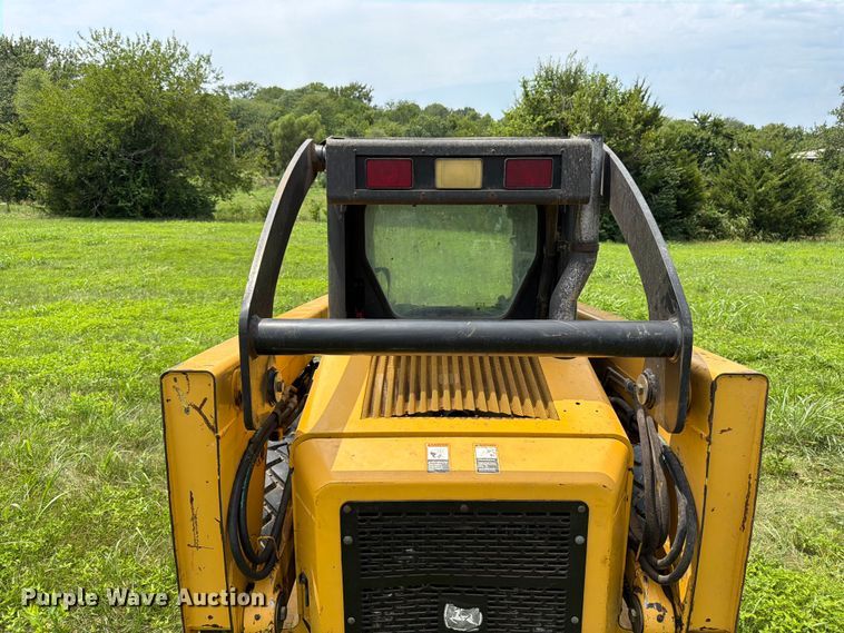 image for item FK3313 2005 John Deere 320 skid steer loader