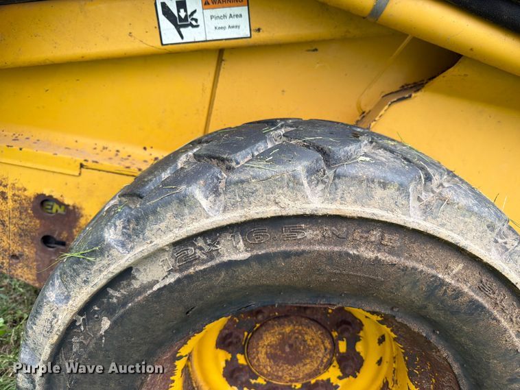 image for item FK3313 2005 John Deere 320 skid steer loader