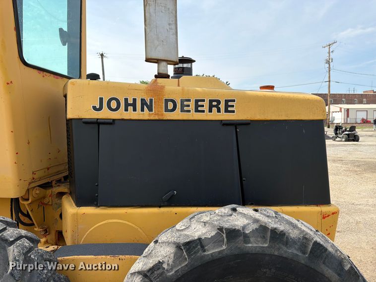 image for item FK3331 1983 John Deere 570A motor grader