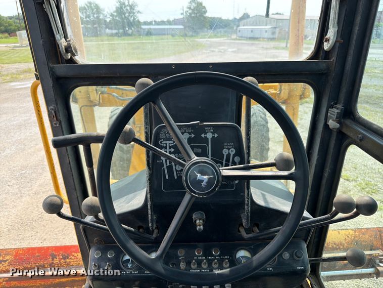 image for item FK3331 1983 John Deere 570A motor grader