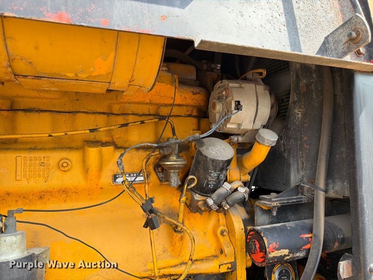 image for item FK3331 1983 John Deere 570A motor grader