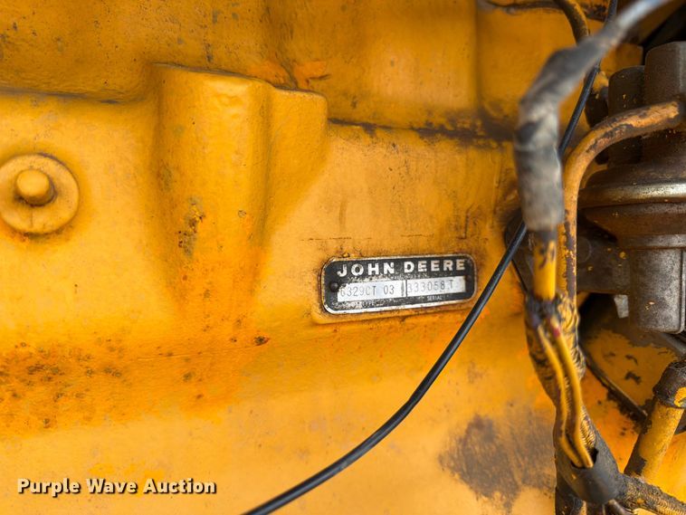 image for item FK3331 1983 John Deere 570A motor grader