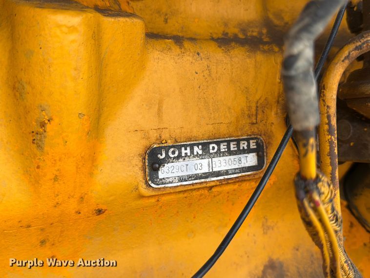 image for item FK3331 1983 John Deere 570A motor grader