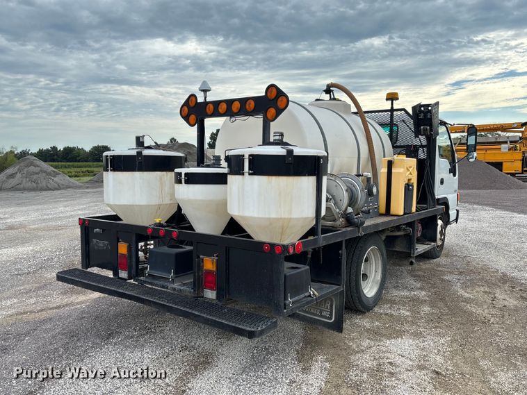 image for item DZ4641 2001 Isuzu NQR flatbed truck