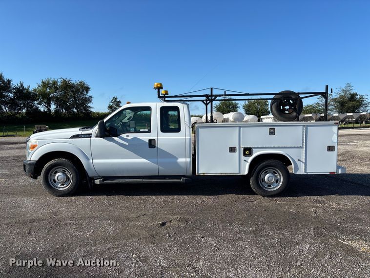 image for item DZ4673 2011 Ford F350 Super Duty XL Ext. Cab utility bed pickup truck