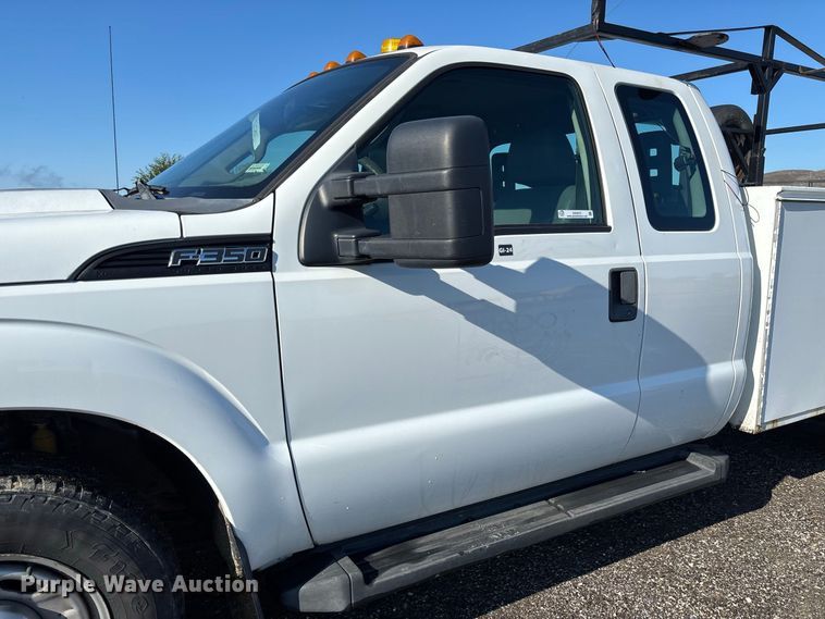 image for item DZ4673 2011 Ford F350 Super Duty XL Ext. Cab utility bed pickup truck