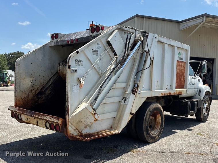 image for item ER3244 1999 GMC C7 refuse truck