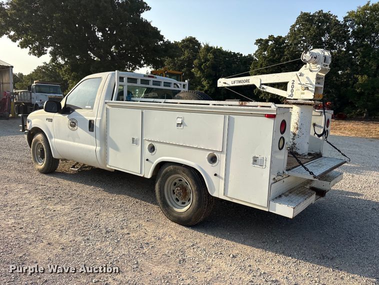 image for item ET0370 1999 Ford F250 Super Duty utility bed pickup truck