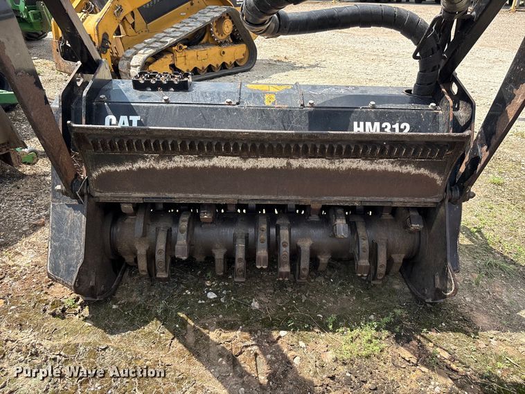 image for item EU0782 2006 Caterpillar HM312 skid steer mulcher