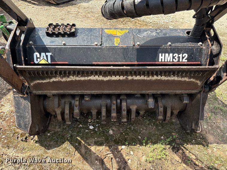 image for item EU0782 2006 Caterpillar HM312 skid steer mulcher