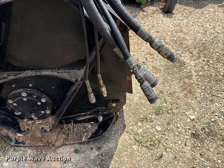 image for item EU0782 2006 Caterpillar HM312 skid steer mulcher