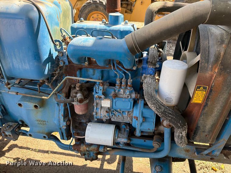 image for item EV2488 1984 Ford 1910 tractor