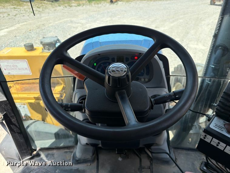 image for item EX2596 2010 New Holland T6030 MFWD tractor