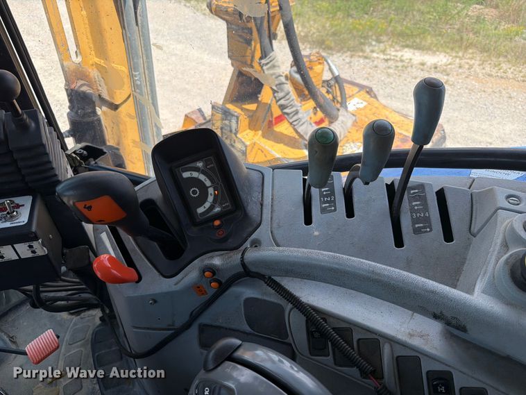 image for item EX2596 2010 New Holland T6030 MFWD tractor
