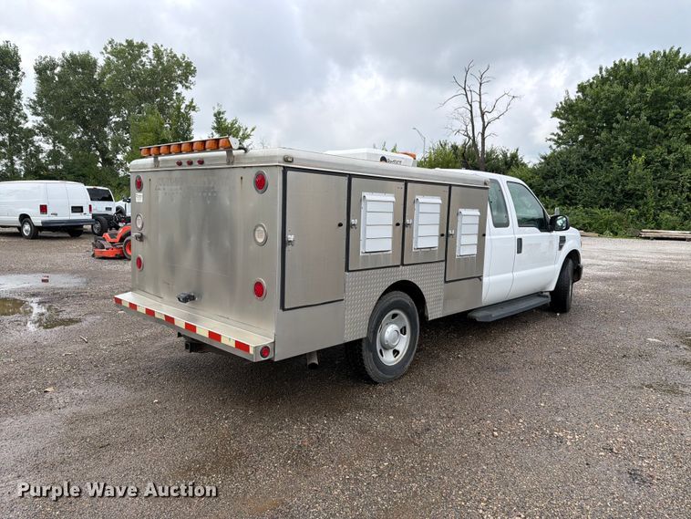 image for item FH6257 2009 Ford F250 Super Duty XL Ext. Cab animal control pickup truck