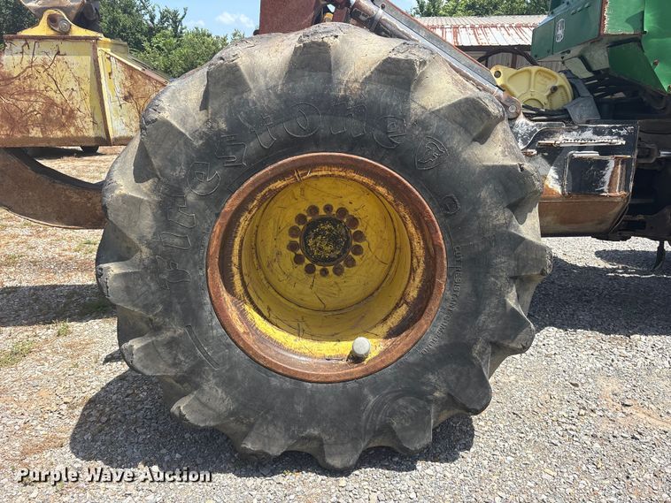 image for item ET0321 2012 John Deere 648H skidder