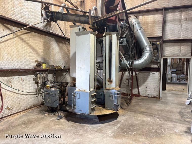Merville machine material bagger
