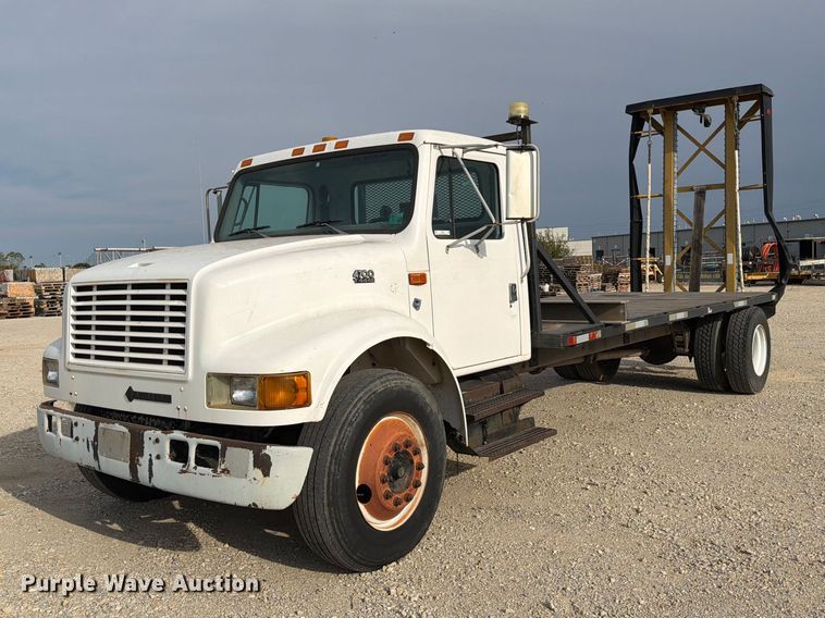 1998 International 4700 flatbed truck with crash attenuator