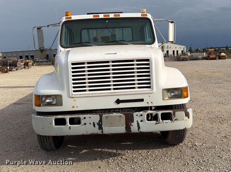 image for item EW8691 1998 International 4700 flatbed truck with crash attenuator