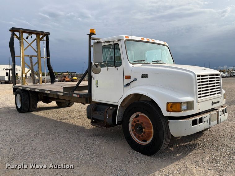 image for item EW8691 1998 International 4700 flatbed truck with crash attenuator