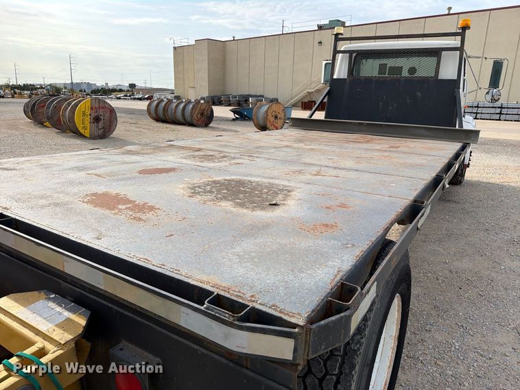 image for item EW8691 1998 International 4700 flatbed truck with crash attenuator
