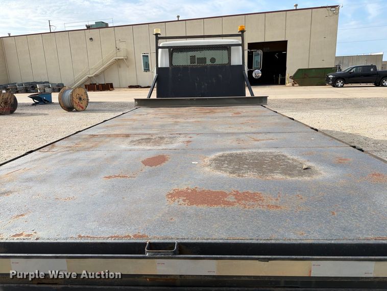 image for item EW8691 1998 International 4700 flatbed truck with crash attenuator