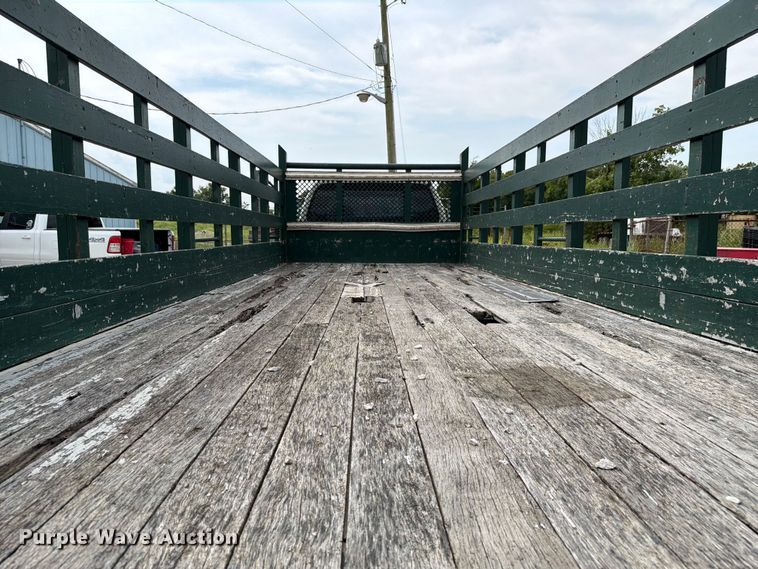 image for item FC3284 2004 Ford F650 Super Duty Crew Cab flatbed truck