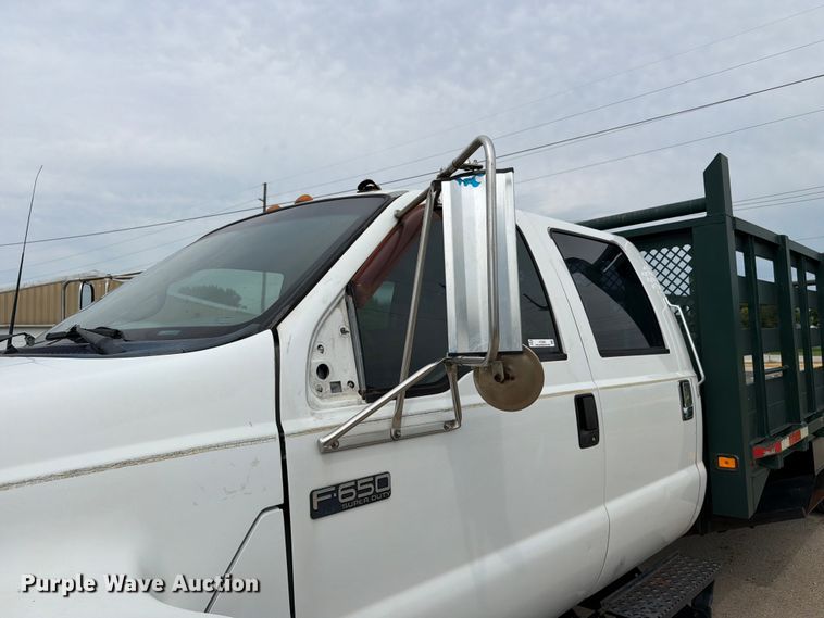 image for item FC3284 2004 Ford F650 Super Duty Crew Cab flatbed truck