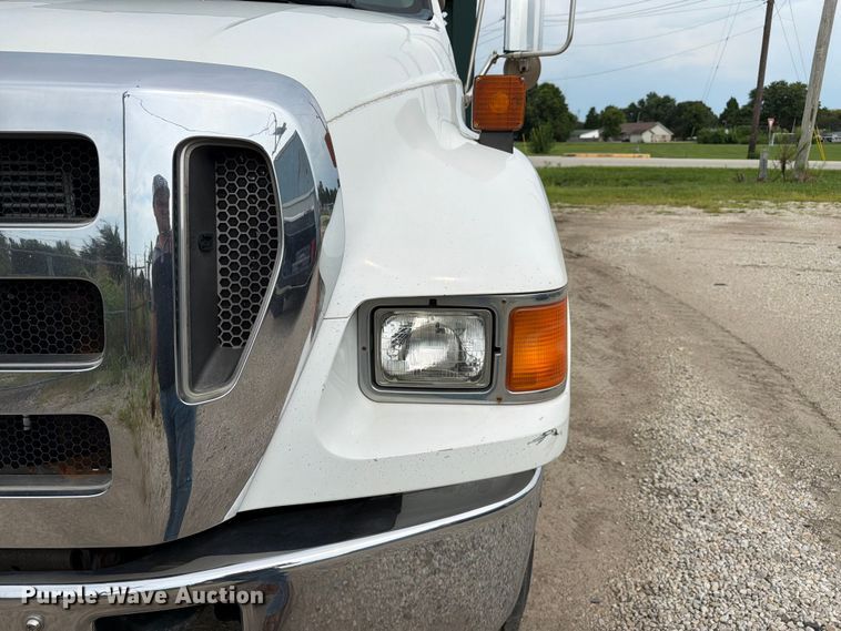 image for item FC3284 2004 Ford F650 Super Duty Crew Cab flatbed truck