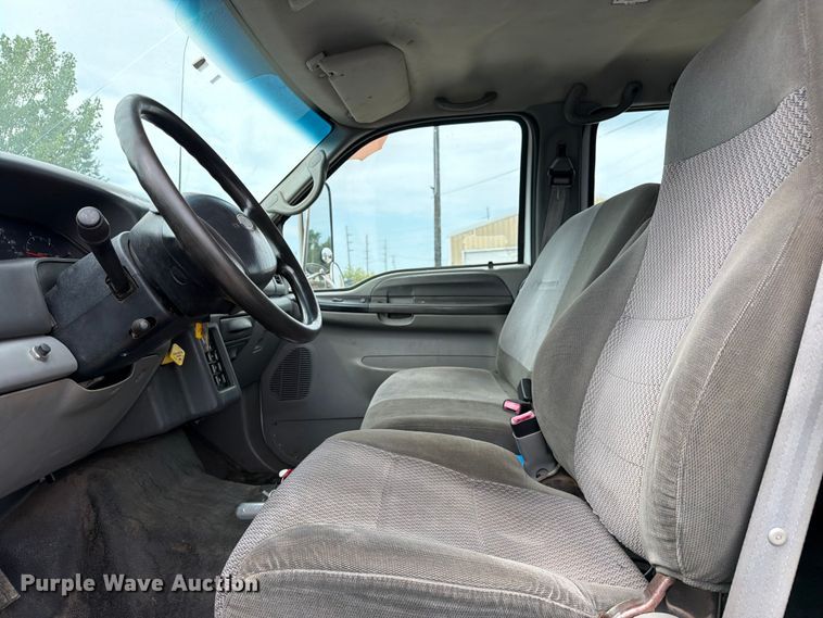 image for item FC3284 2004 Ford F650 Super Duty Crew Cab flatbed truck
