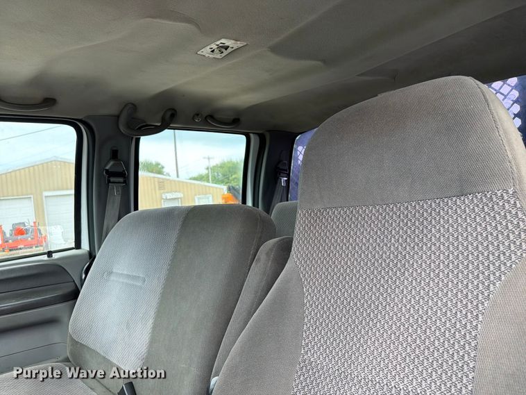 image for item FC3284 2004 Ford F650 Super Duty Crew Cab flatbed truck