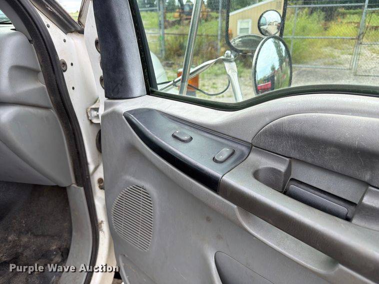 image for item FC3284 2004 Ford F650 Super Duty Crew Cab flatbed truck