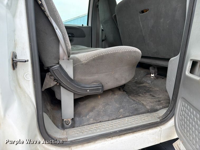image for item FC3284 2004 Ford F650 Super Duty Crew Cab flatbed truck