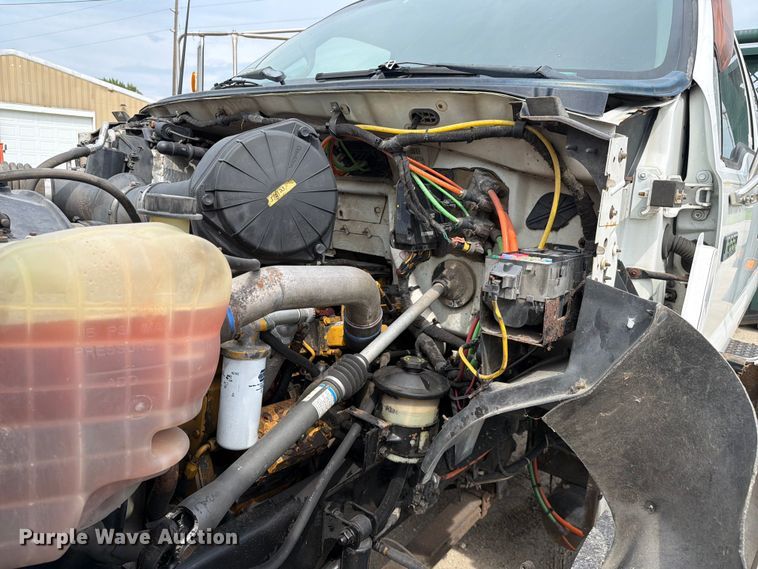image for item FC3284 2004 Ford F650 Super Duty Crew Cab flatbed truck