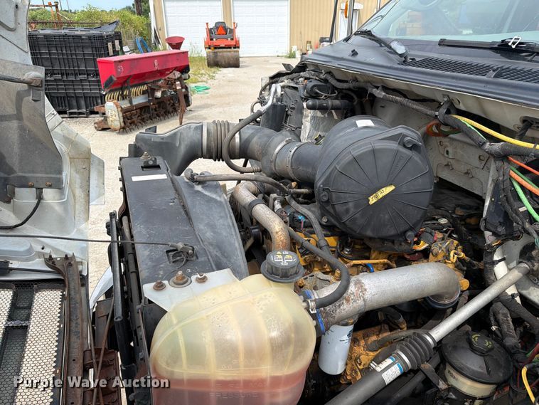image for item FC3284 2004 Ford F650 Super Duty Crew Cab flatbed truck