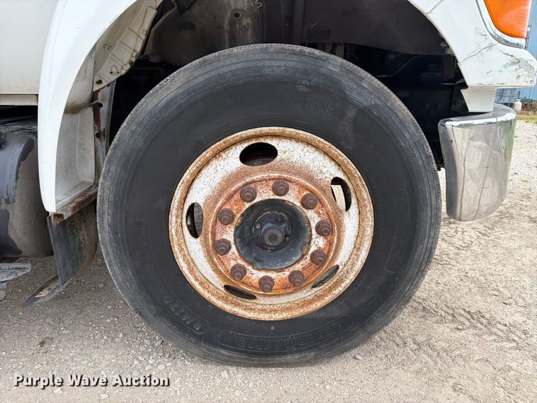 image for item FC3284 2004 Ford F650 Super Duty Crew Cab flatbed truck