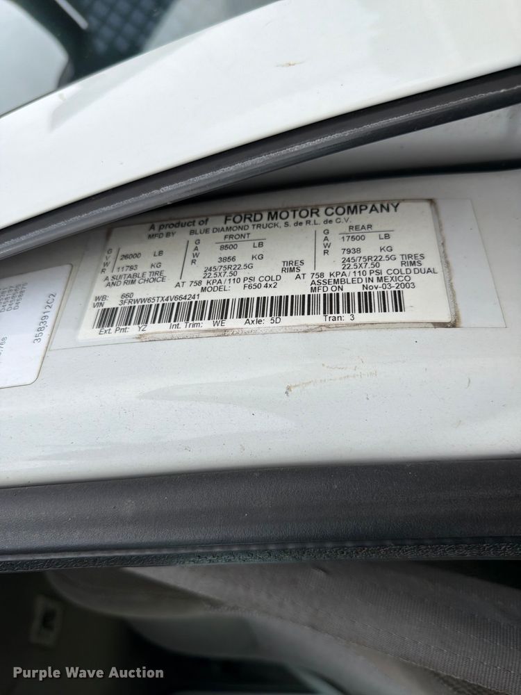 image for item FC3284 2004 Ford F650 Super Duty Crew Cab flatbed truck