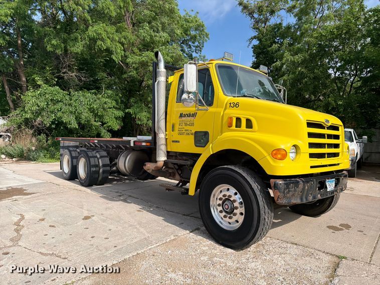 image for item FK0253 1999 Sterling L7500 flatbed truck