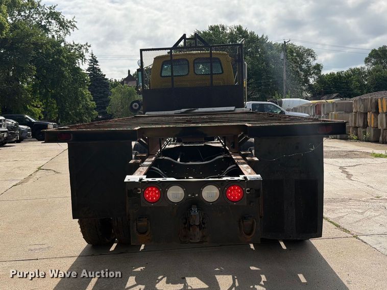 image for item FK0253 1999 Sterling L7500 flatbed truck