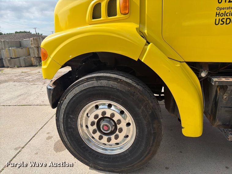 image for item FK0253 1999 Sterling L7500 flatbed truck
