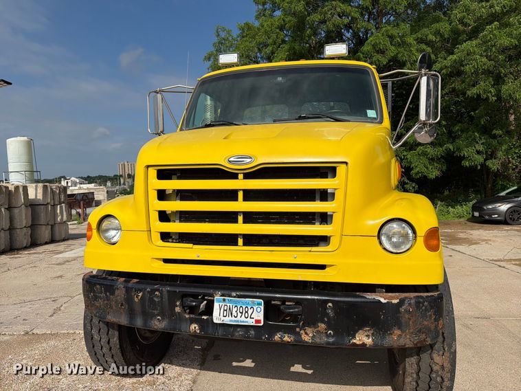 image for item FK0253 1999 Sterling L7500 flatbed truck