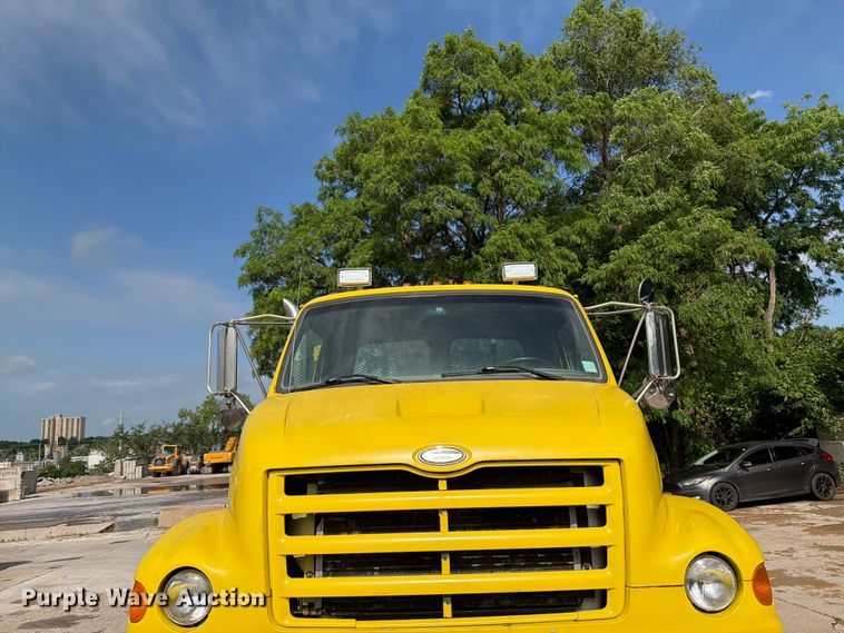 image for item FK0253 1999 Sterling L7500 flatbed truck